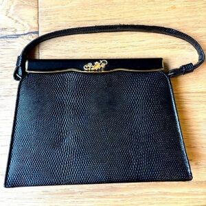 After five vintage evening hand bag